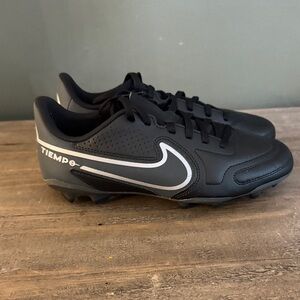 Nike Tiempo Men’s Black Soccer Cleats with Silver Swoosh